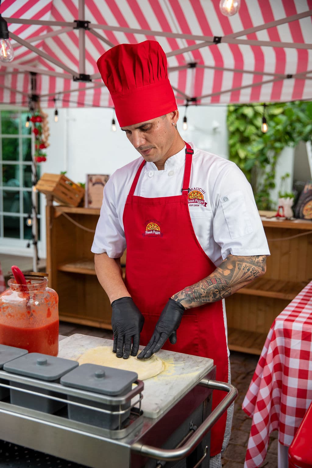 D' Mauchi Fresh Pizza serving a private party
