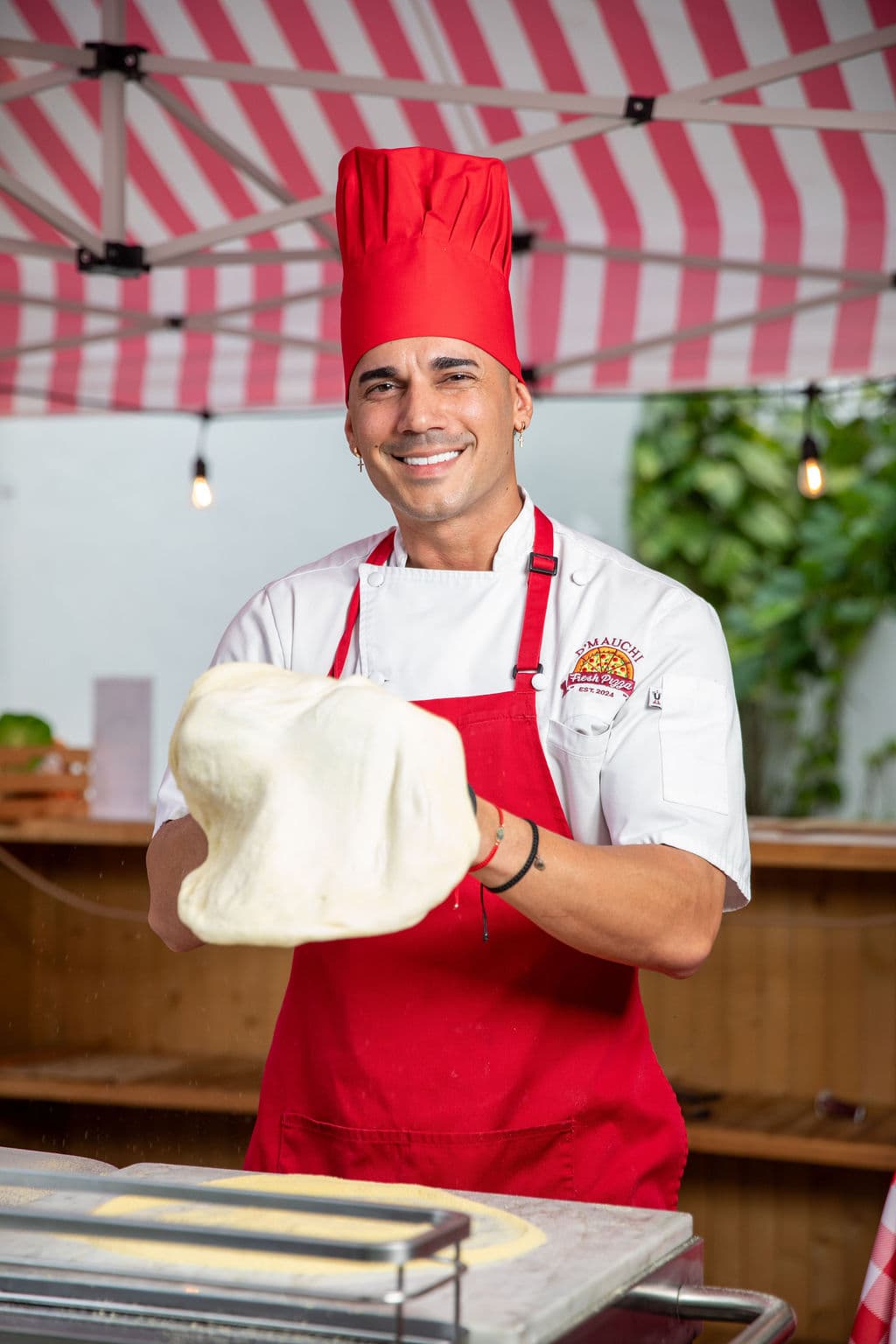 D' Mauchi Fresh Pizza serving a private party