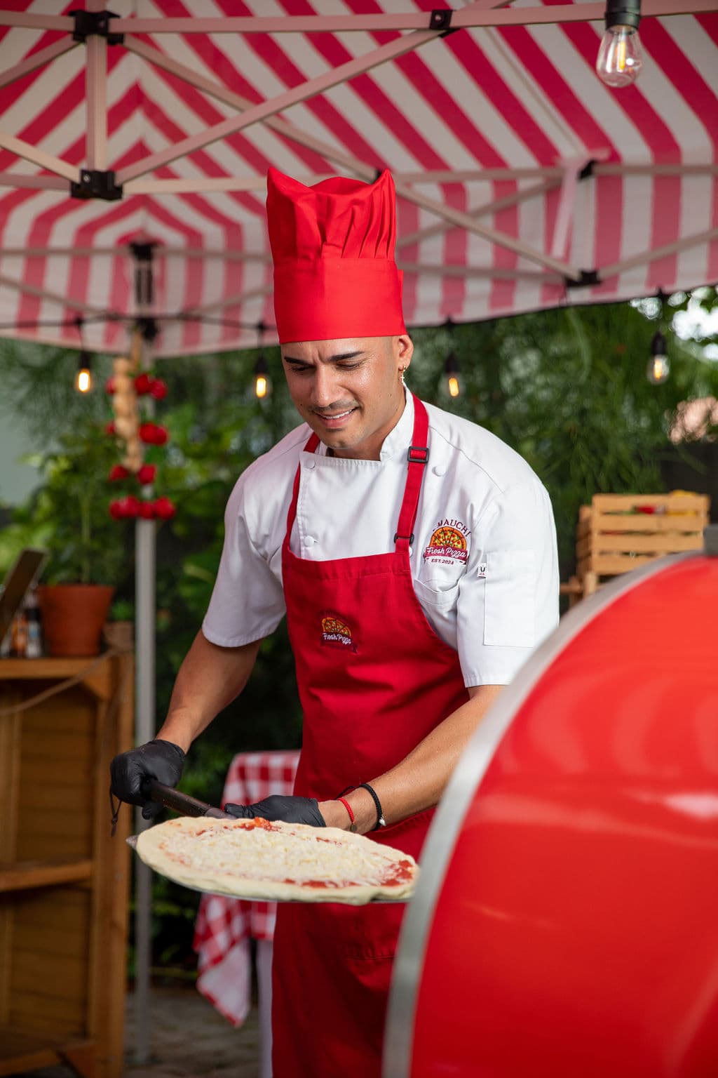 D' Mauchi Fresh Pizza serving a private party